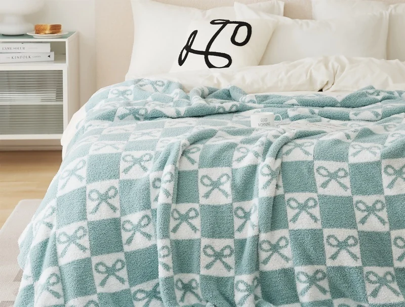 hot-selling-new-bow-pattern-100-polyester-double-side-super-cozy-knit-throw-blanket-for-winter-zs